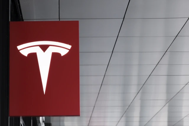Tesla logo on a board